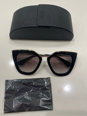 Prada Black and Gold Cat Eye Sunglasses